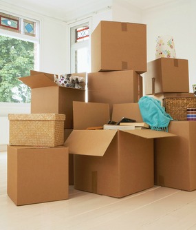 Step 18 to Buying a Home: Hire Movers & Start Packing!